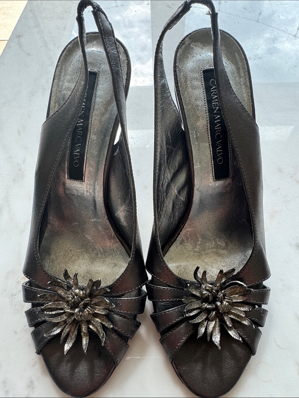 Carmen Marc Valvo Metallic Black Peep-Toe Slingback Heels with Floral Accent